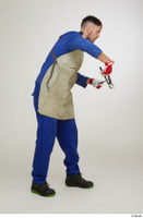  Photos Raul Conley standing whole body working with hammer and pliers 0007.jpg